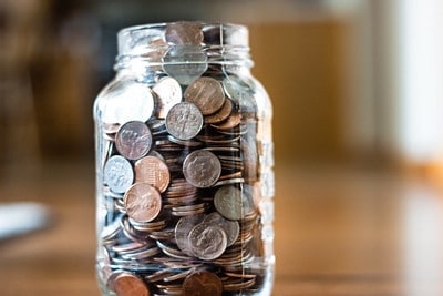 Jar of Coins: Presentation Perfection saves quarters.